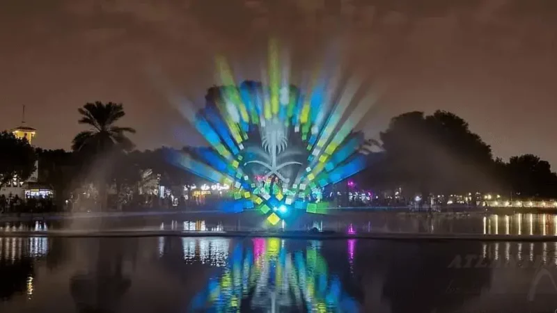 Écran d'eau lors d'un évènement à Riyadh avec de multiples représentations vertes et bleues
